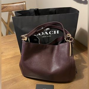 Coach Dalton Bag.  Oxblood with gold detail.